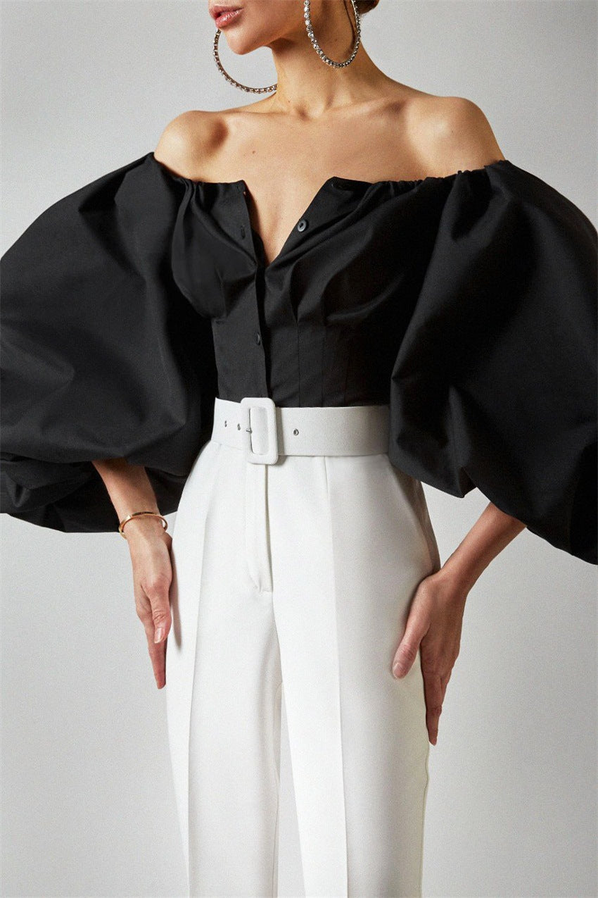 Spring and summer new design sense long sleeved bubble lantern sleeves with shoulder leakage European and American women's shirt top