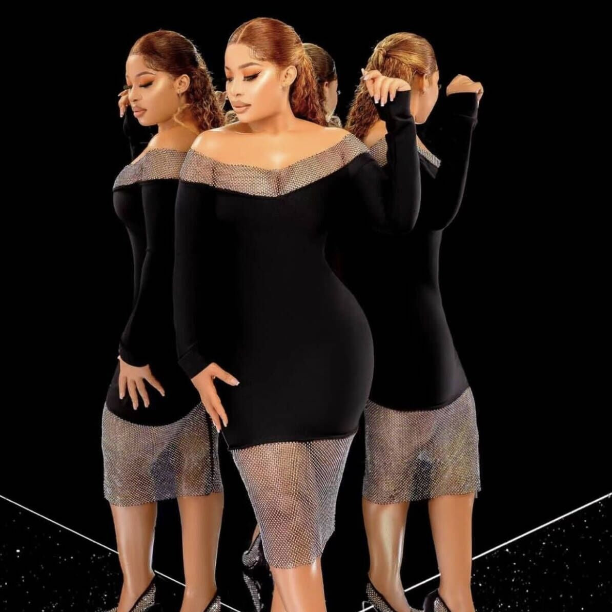 Evening dress with rhinestones, long sleeves, and an off-the-shoulder neckline.